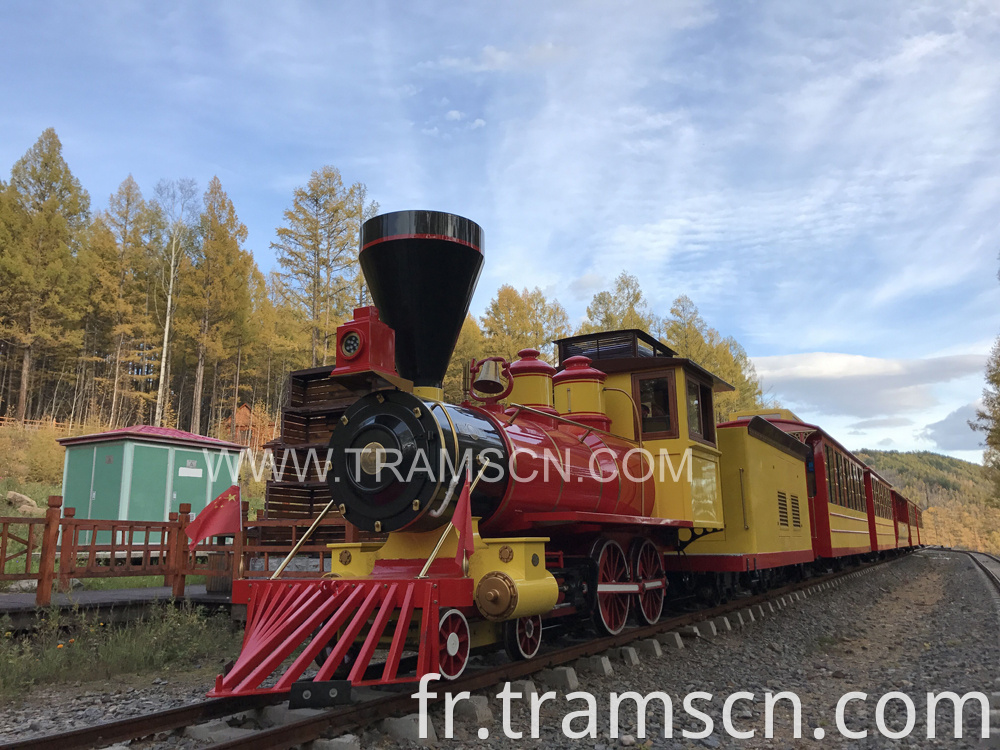 sightseeing train forest train with red and yellow colour at autumn